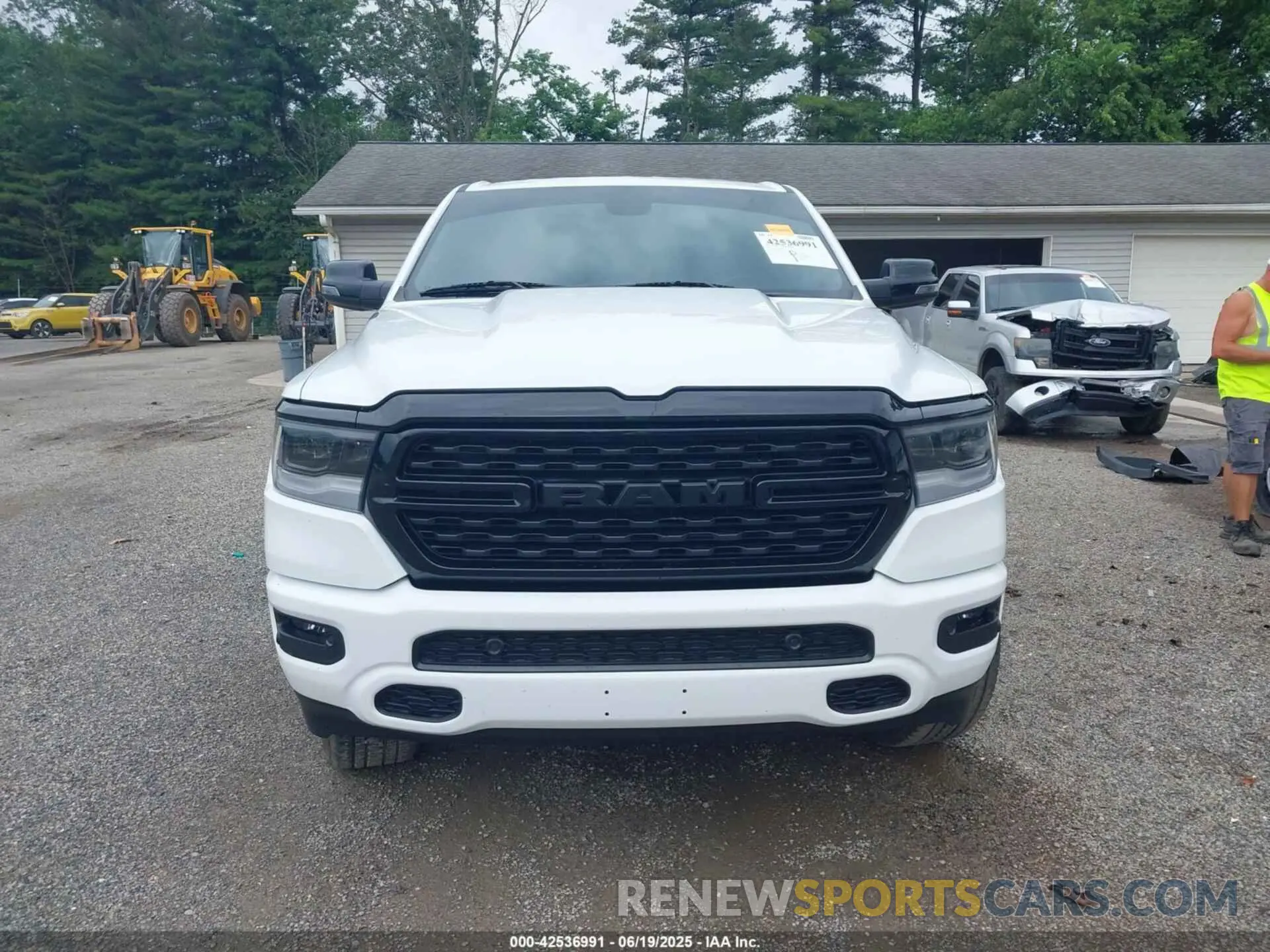 12 Photograph of a damaged car 1C6RRFFG6PN699322 RAM 1500 2023