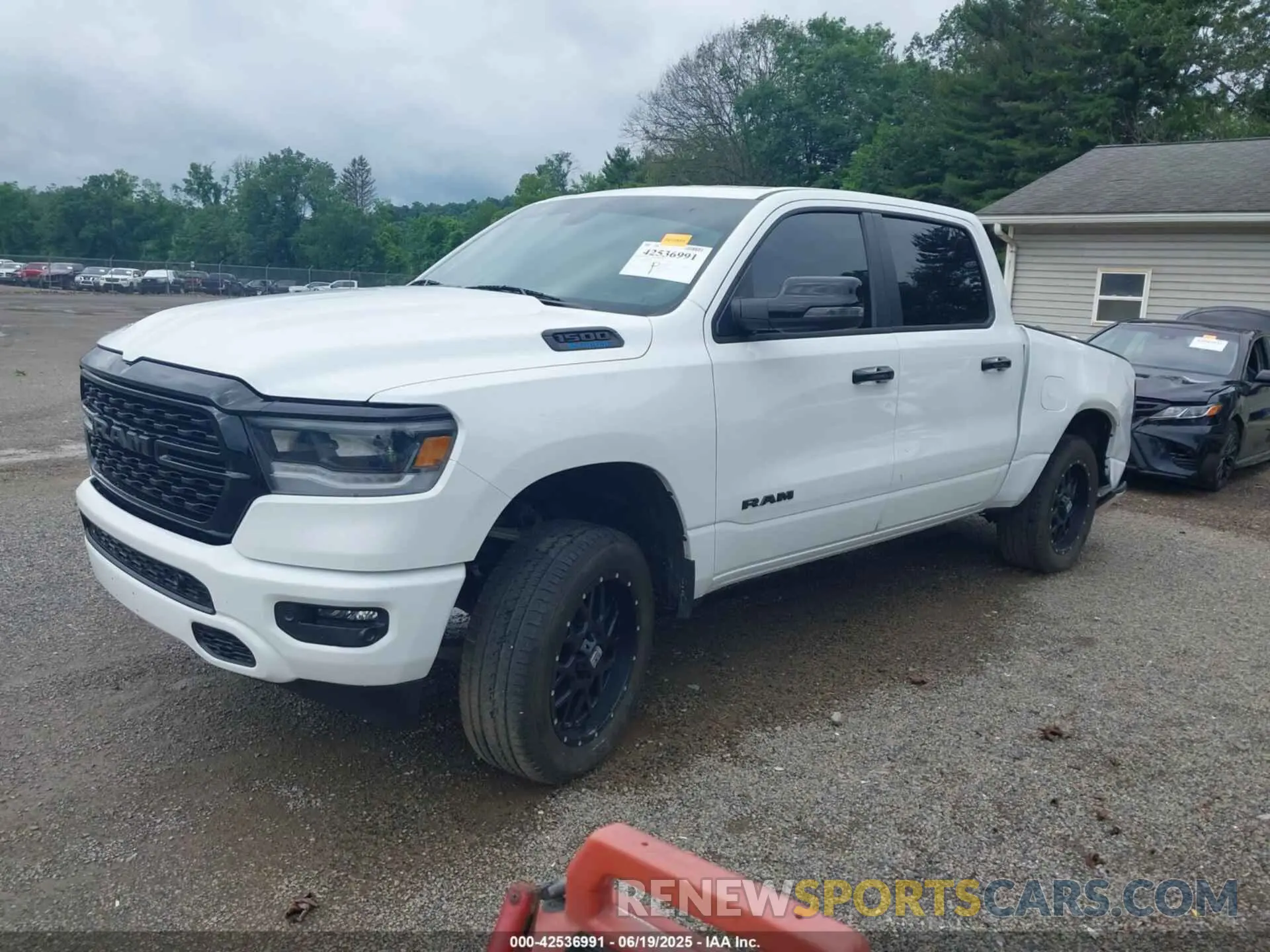 2 Photograph of a damaged car 1C6RRFFG6PN699322 RAM 1500 2023