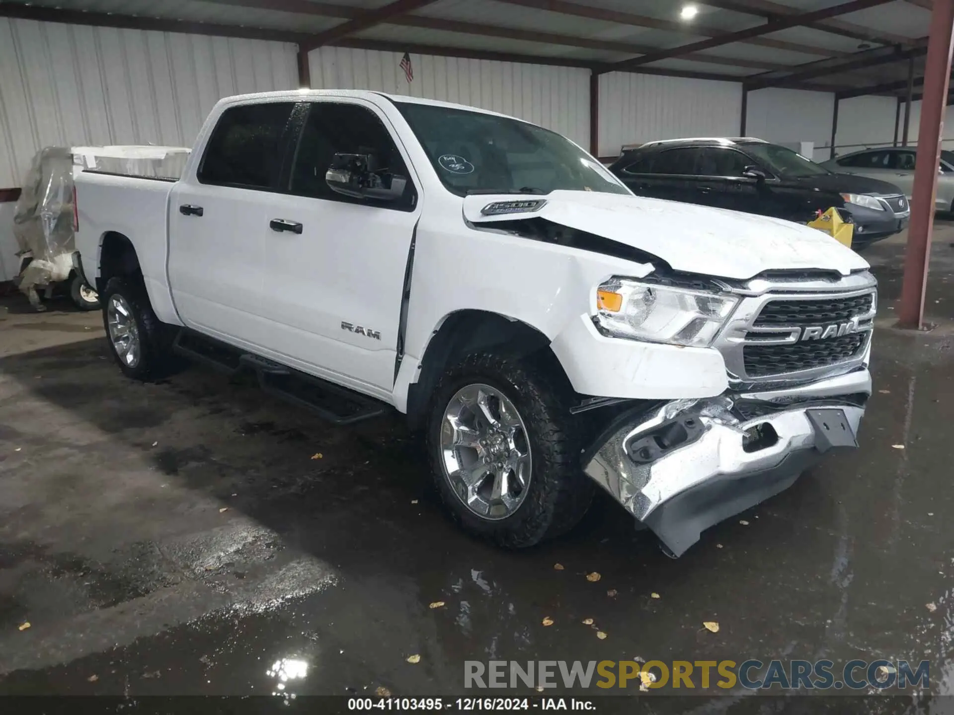 1 Photograph of a damaged car 1C6RRFFG7PN698664 RAM 1500 2023
