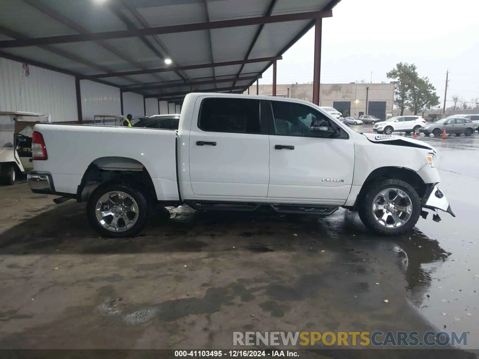 14 Photograph of a damaged car 1C6RRFFG7PN698664 RAM 1500 2023