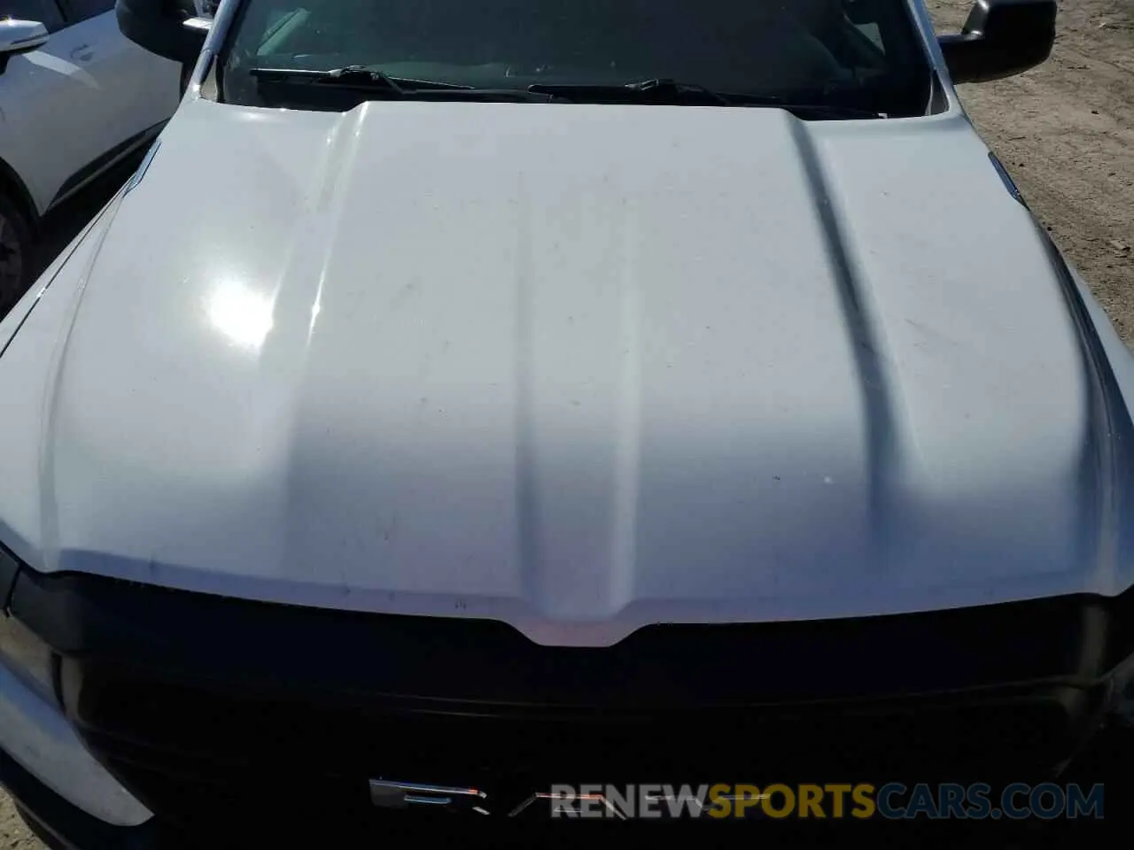 11 Photograph of a damaged car 1C6SRFCT5PN677234 RAM 1500 2023