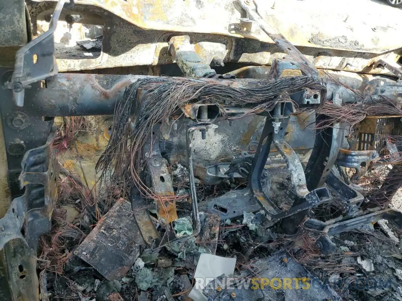 9 Photograph of a damaged car 1C6SRFFT0PN580275 RAM 1500 2023