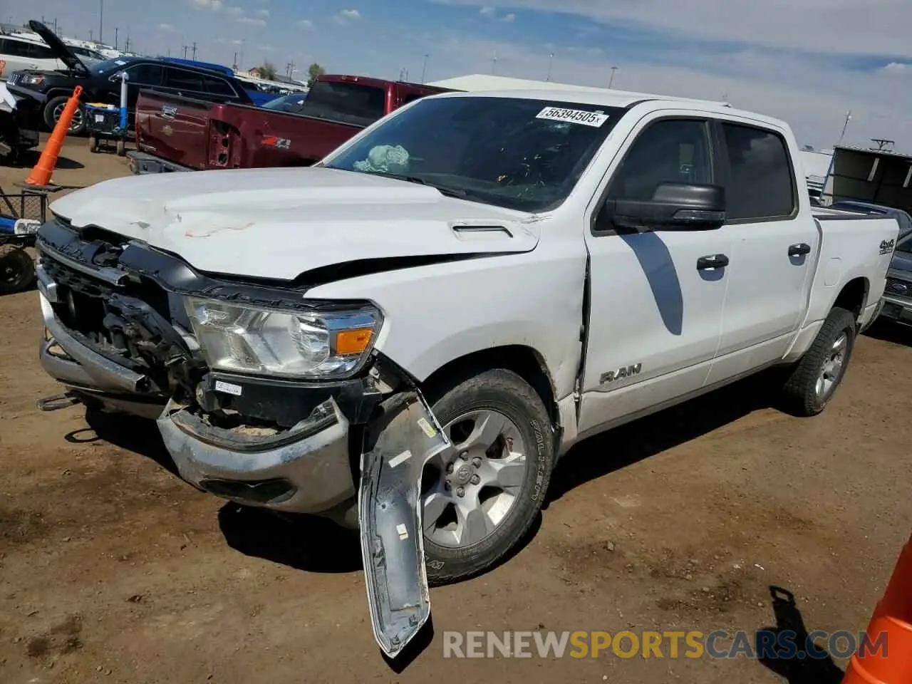 1 Photograph of a damaged car 1C6SRFFT0PN616465 RAM 1500 2023