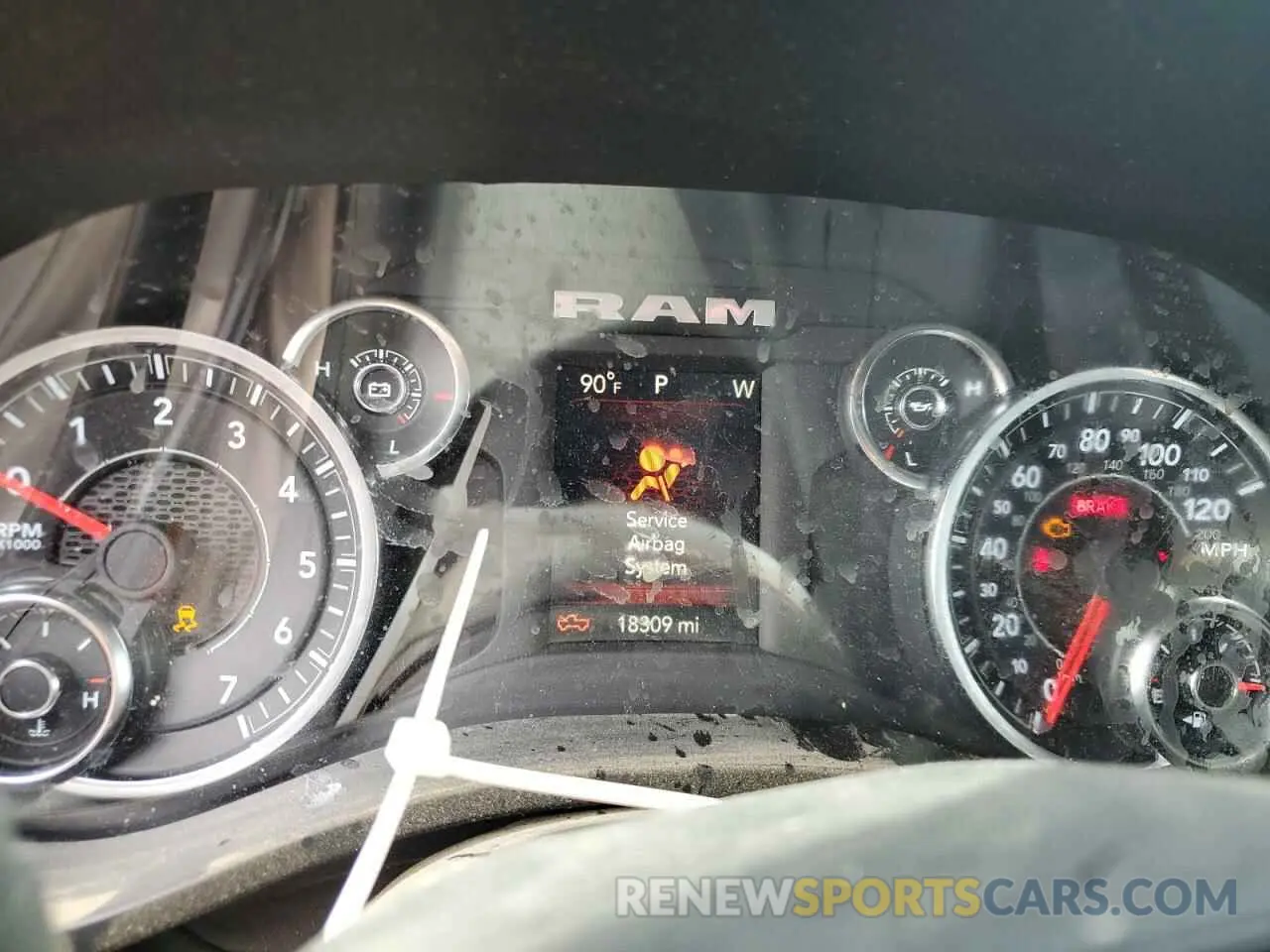 9 Photograph of a damaged car 1C6SRFFT0PN616465 RAM 1500 2023