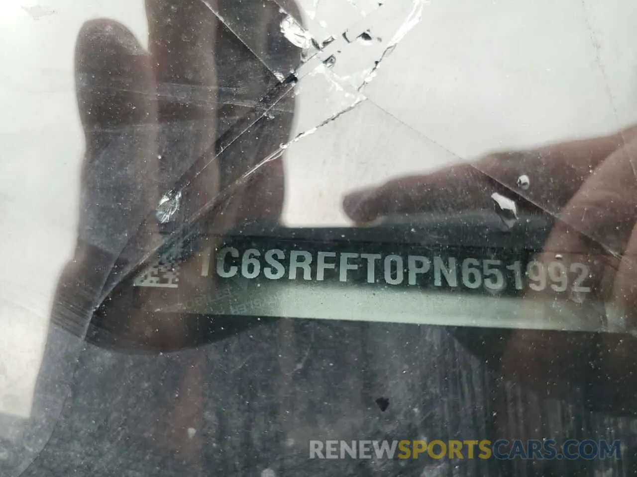12 Photograph of a damaged car 1C6SRFFT0PN651992 RAM 1500 2023