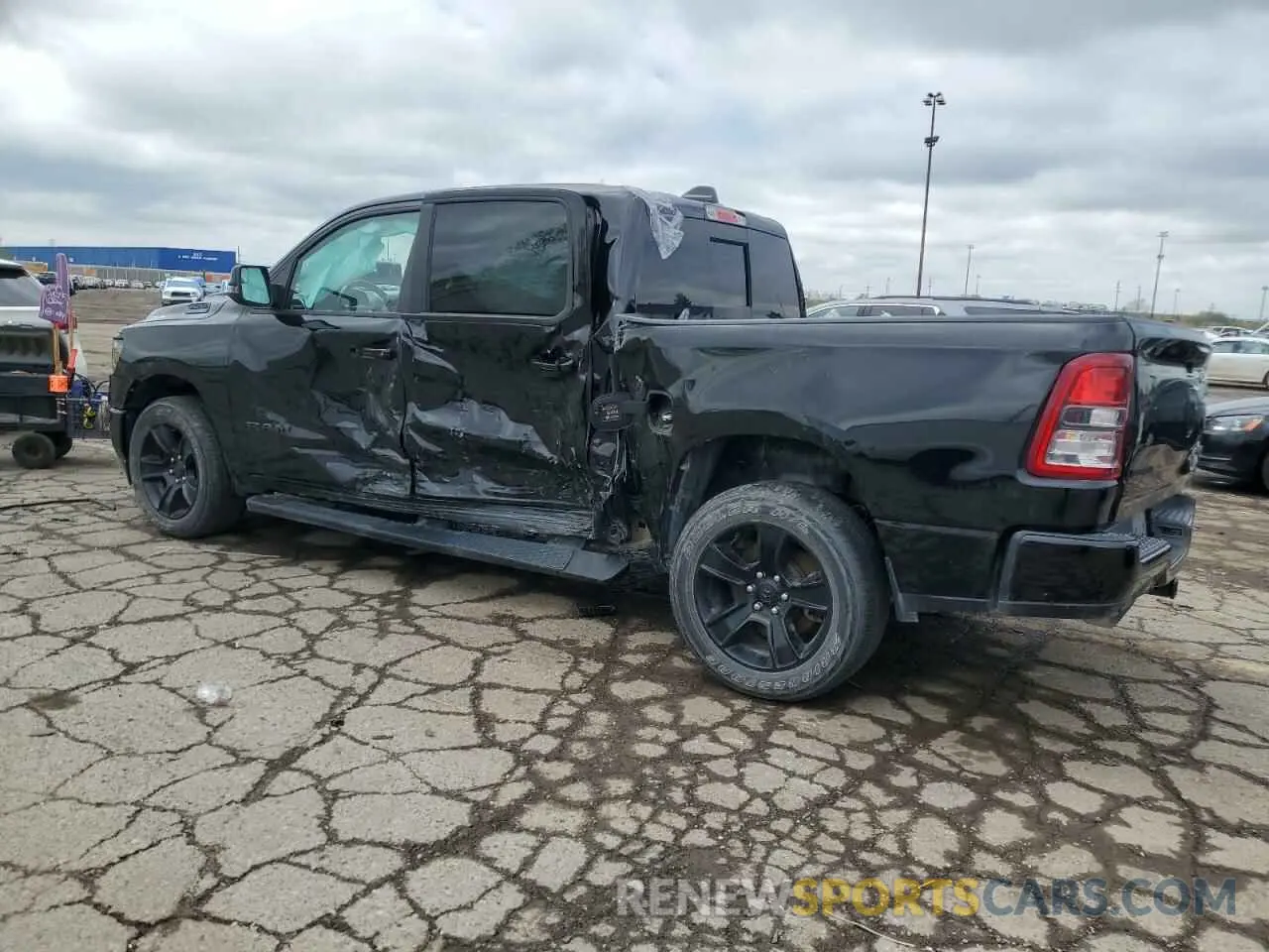 2 Photograph of a damaged car 1C6SRFFT0PN651992 RAM 1500 2023