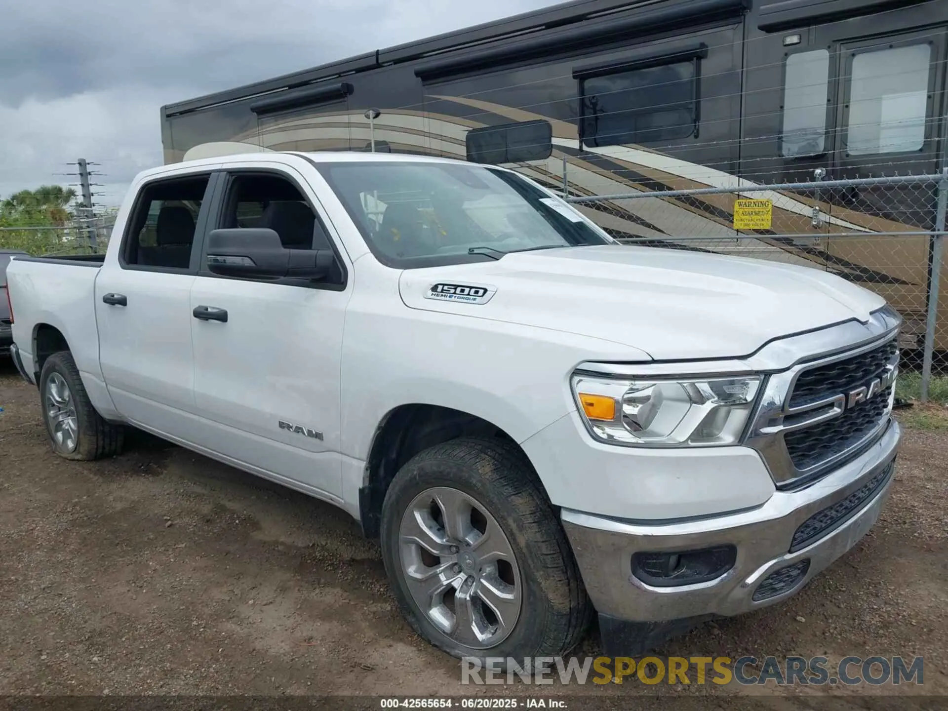 12 Photograph of a damaged car 1C6SRFFT0PN702987 RAM 1500 2023