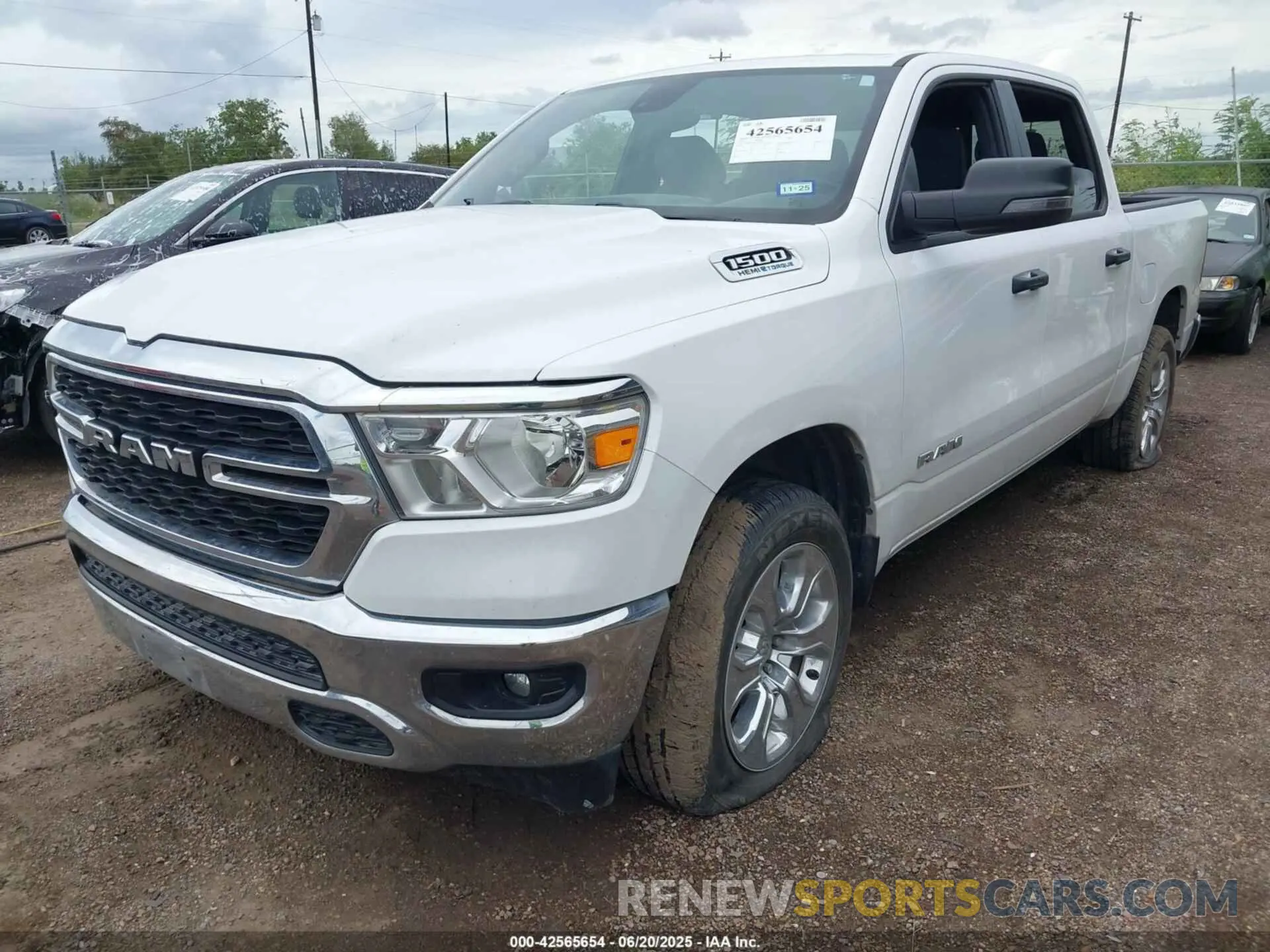 6 Photograph of a damaged car 1C6SRFFT0PN702987 RAM 1500 2023