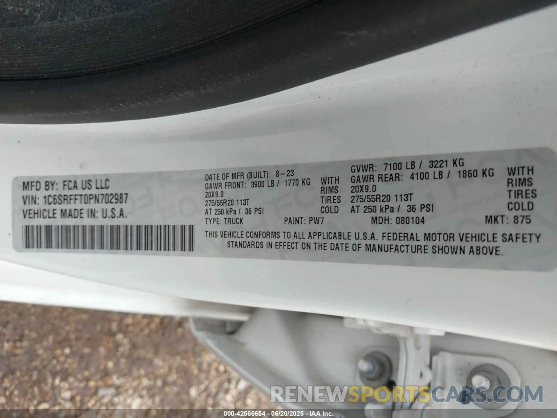 9 Photograph of a damaged car 1C6SRFFT0PN702987 RAM 1500 2023