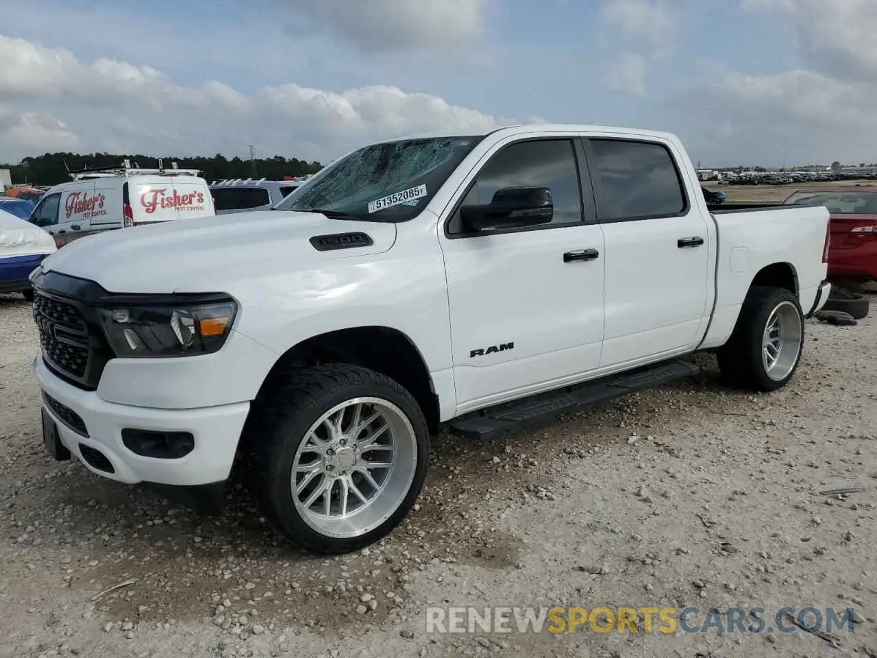 1 Photograph of a damaged car 1C6SRFFT1PN605393 RAM 1500 2023
