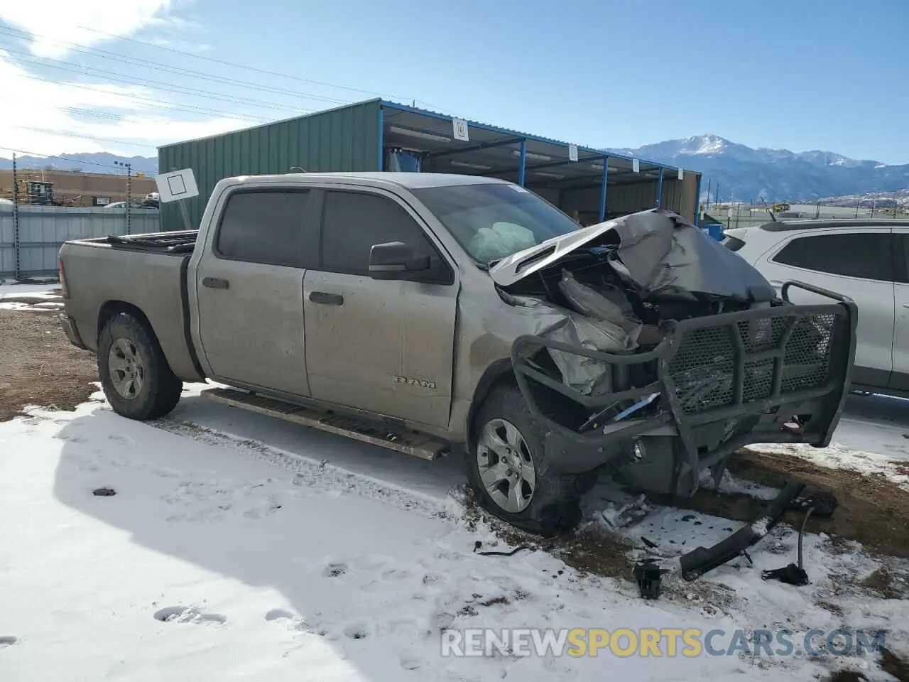 4 Photograph of a damaged car 1C6SRFFT1PN682023 RAM 1500 2023