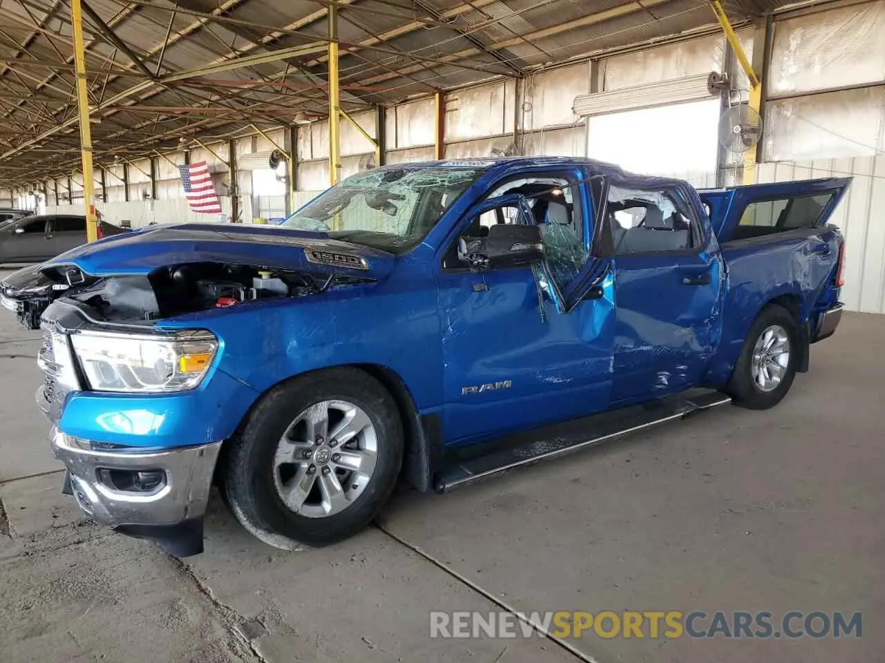 1 Photograph of a damaged car 1C6SRFFT2PN702733 RAM 1500 2023
