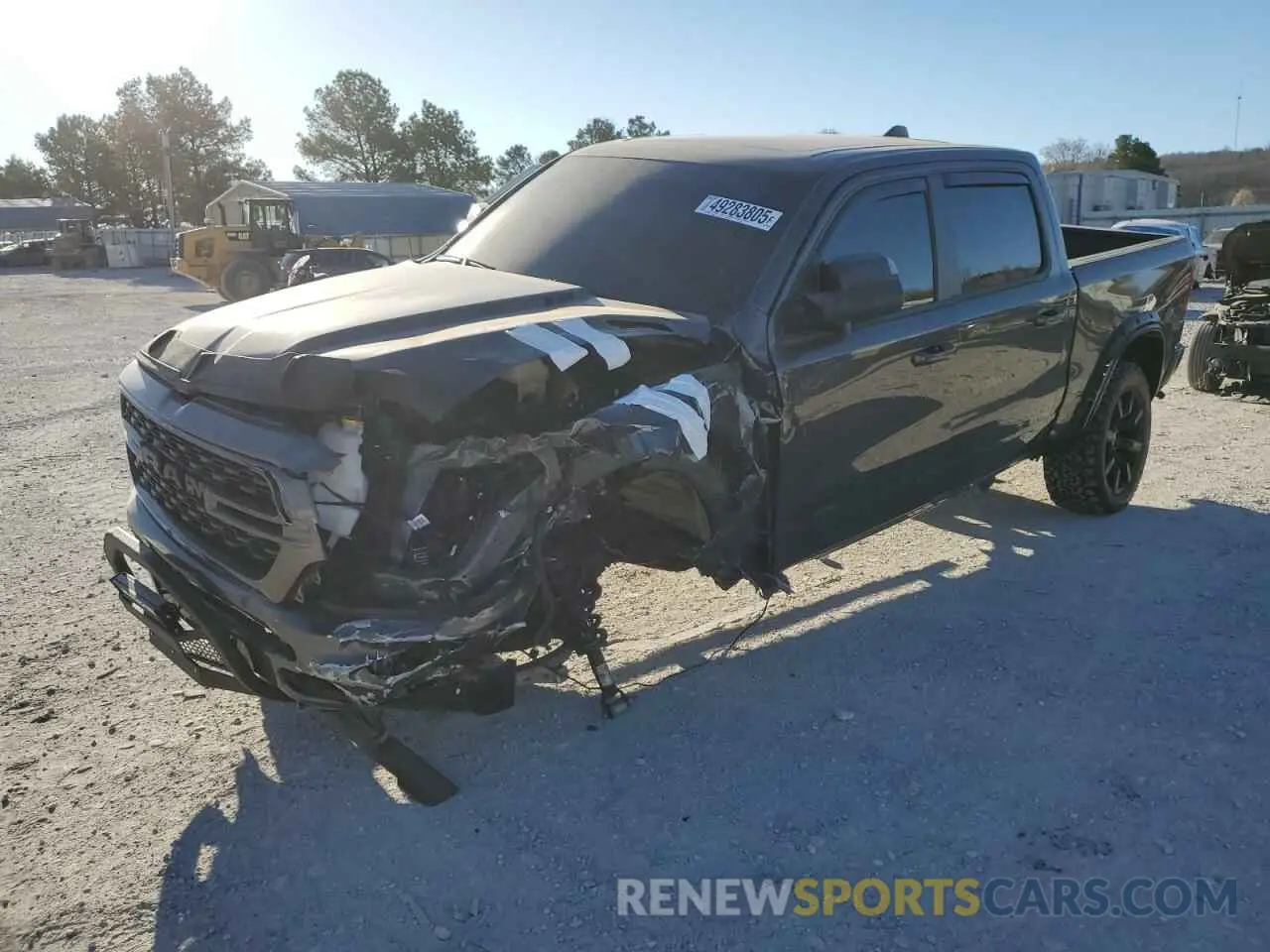1 Photograph of a damaged car 1C6SRFFT3PN602382 RAM 1500 2023
