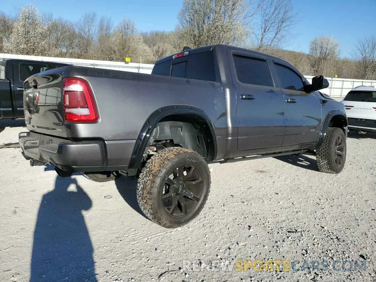 3 Photograph of a damaged car 1C6SRFFT3PN602382 RAM 1500 2023