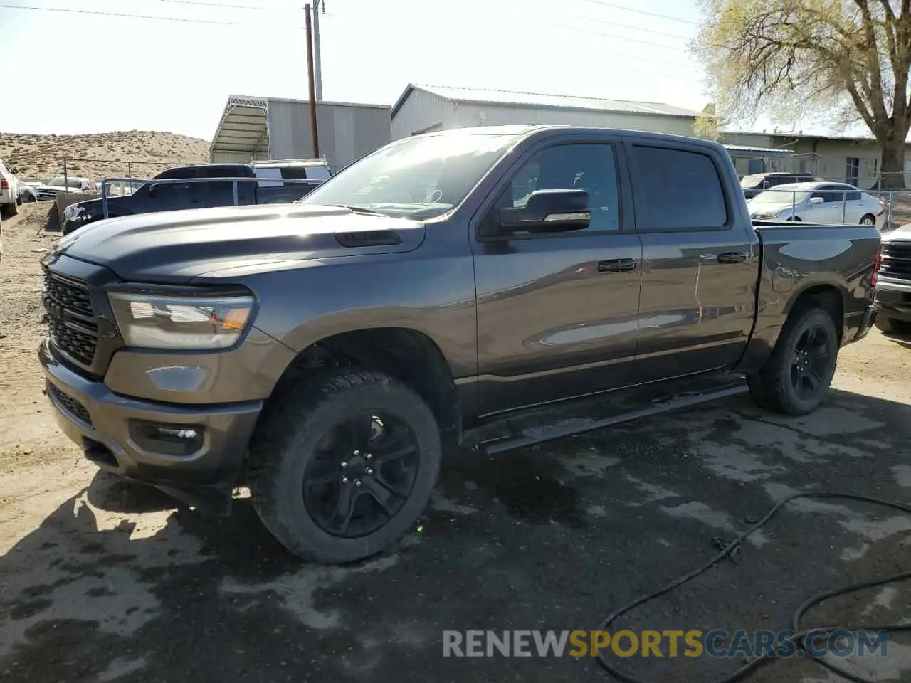 1 Photograph of a damaged car 1C6SRFFT3PN655728 RAM 1500 2023