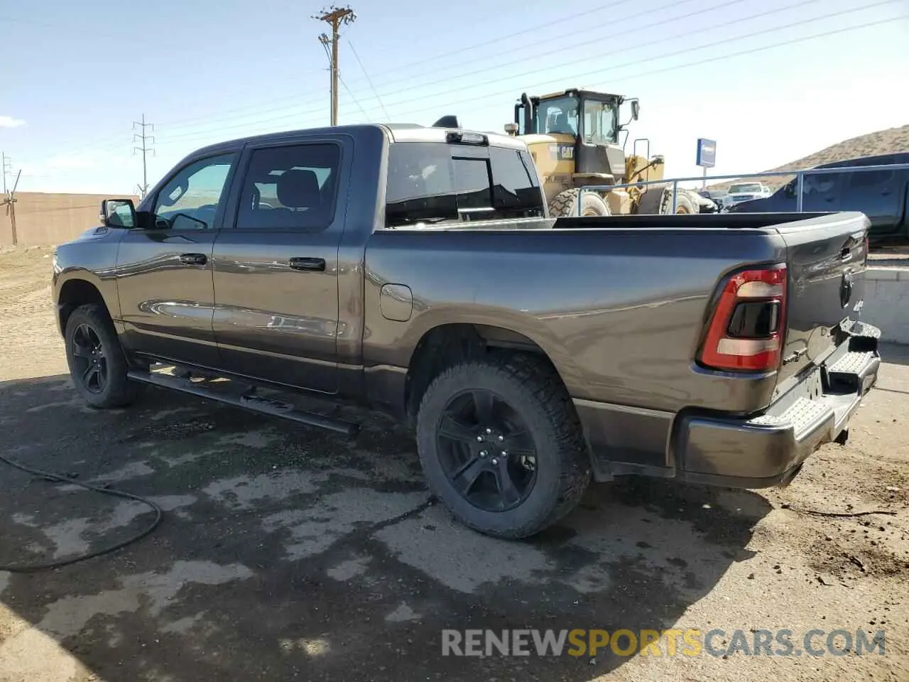 2 Photograph of a damaged car 1C6SRFFT3PN655728 RAM 1500 2023