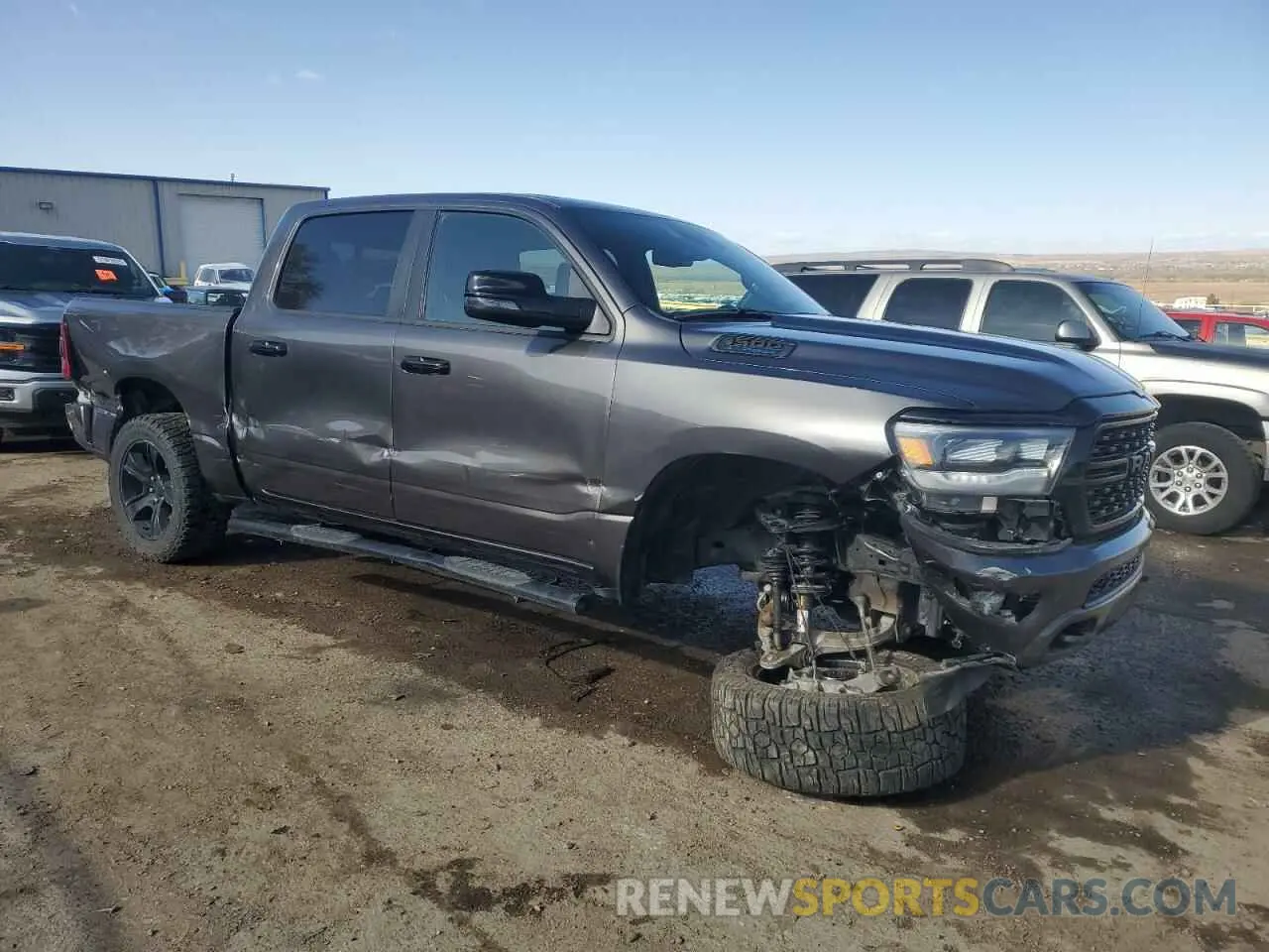 4 Photograph of a damaged car 1C6SRFFT3PN655728 RAM 1500 2023