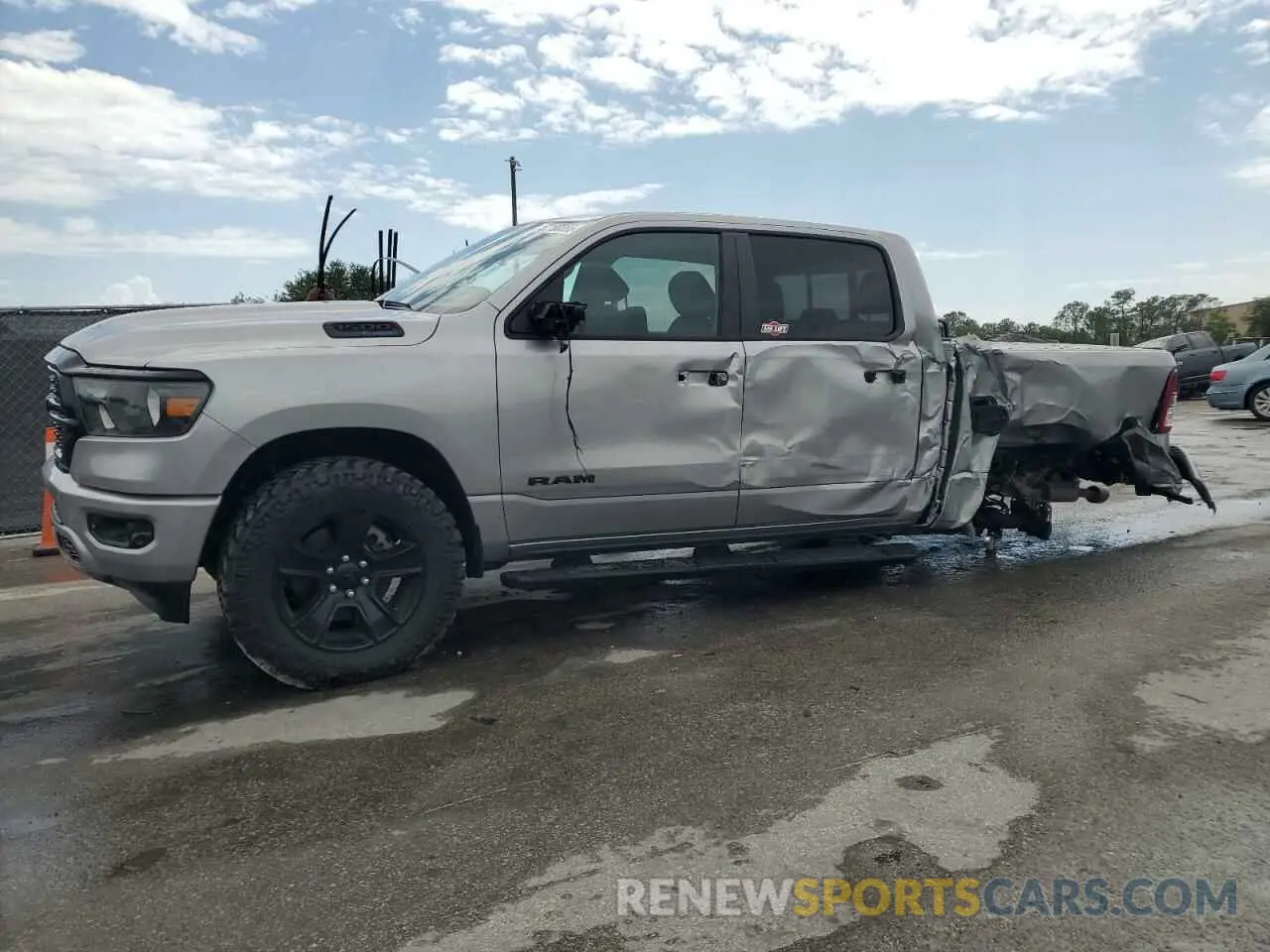 1 Photograph of a damaged car 1C6SRFFT4PN644639 RAM 1500 2023