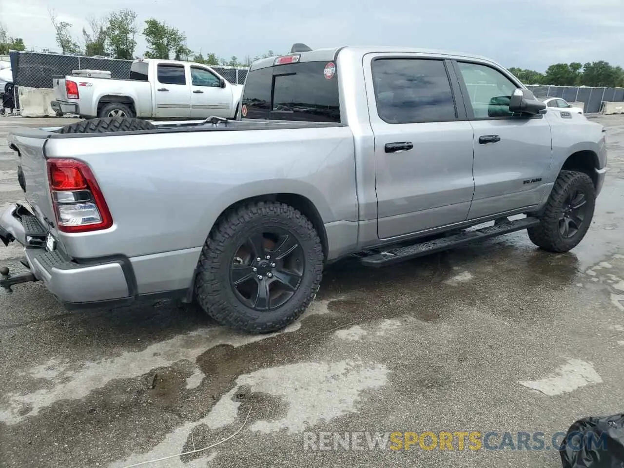 3 Photograph of a damaged car 1C6SRFFT4PN644639 RAM 1500 2023