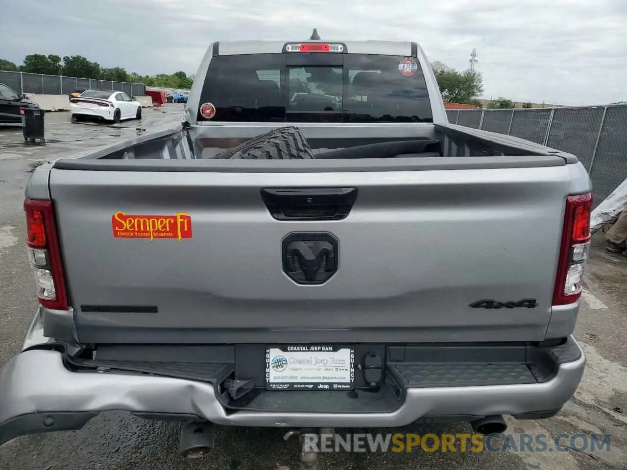 6 Photograph of a damaged car 1C6SRFFT4PN644639 RAM 1500 2023