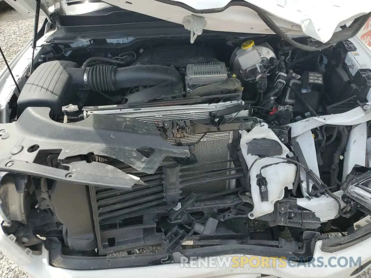11 Photograph of a damaged car 1C6SRFFT4PN665913 RAM 1500 2023