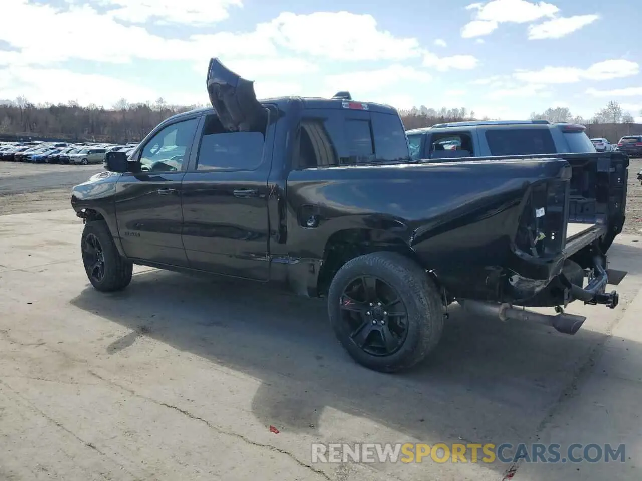2 Photograph of a damaged car 1C6SRFFT4PN678323 RAM 1500 2023
