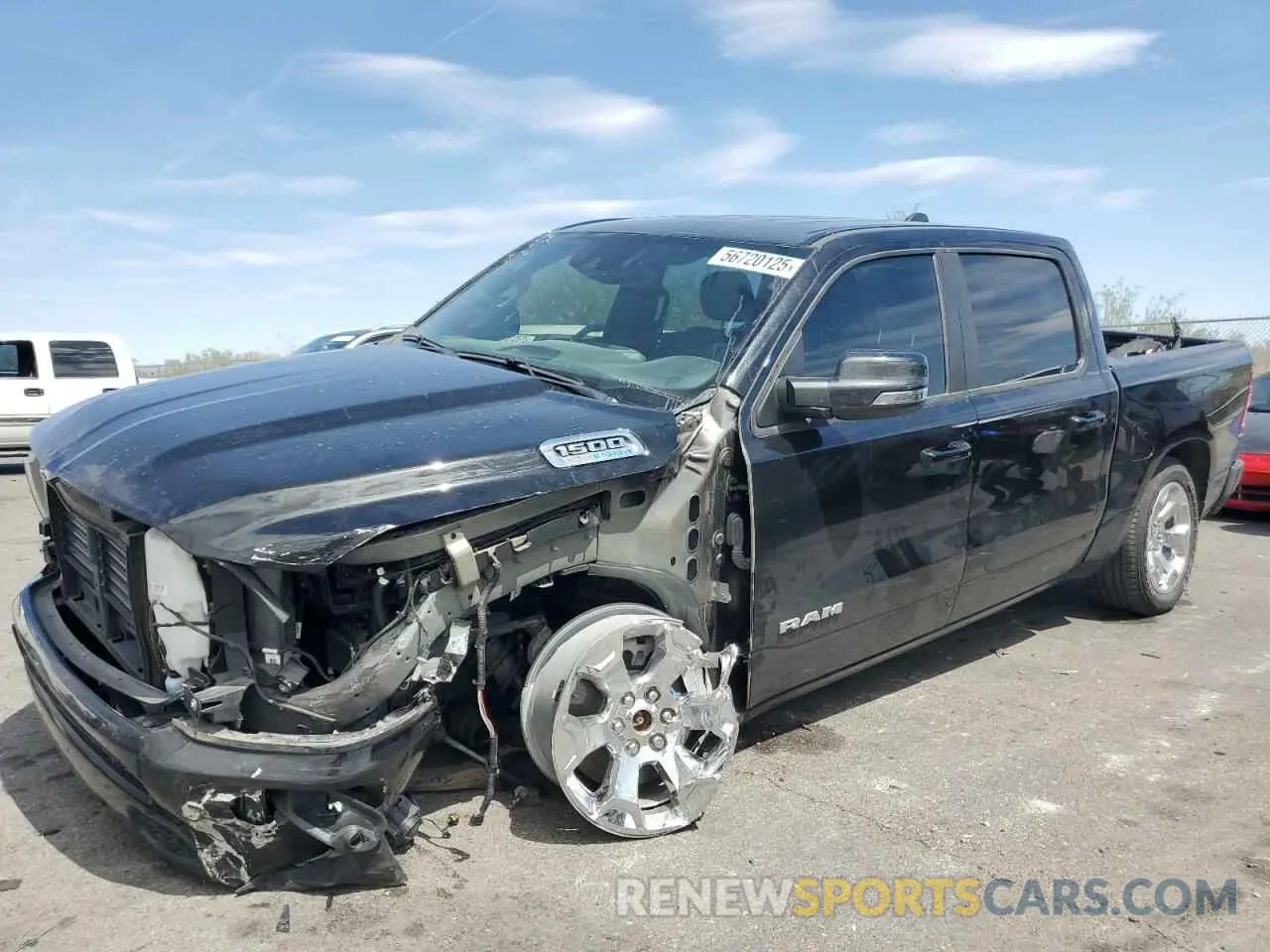 1 Photograph of a damaged car 1C6SRFFT6PN580748 RAM 1500 2023