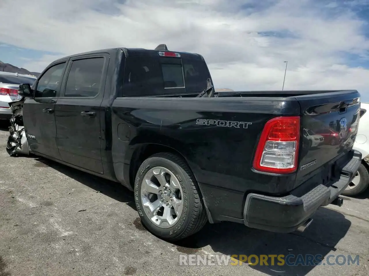 2 Photograph of a damaged car 1C6SRFFT6PN580748 RAM 1500 2023