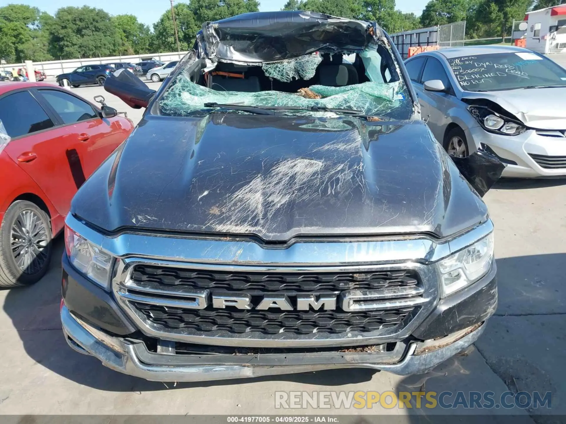 13 Photograph of a damaged car 1C6SRFFT6PN642861 RAM 1500 2023