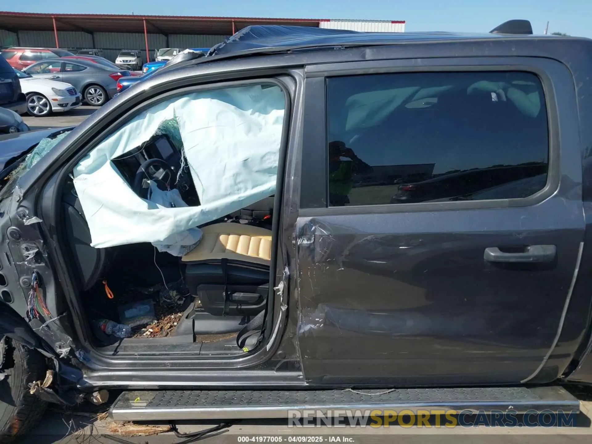 15 Photograph of a damaged car 1C6SRFFT6PN642861 RAM 1500 2023