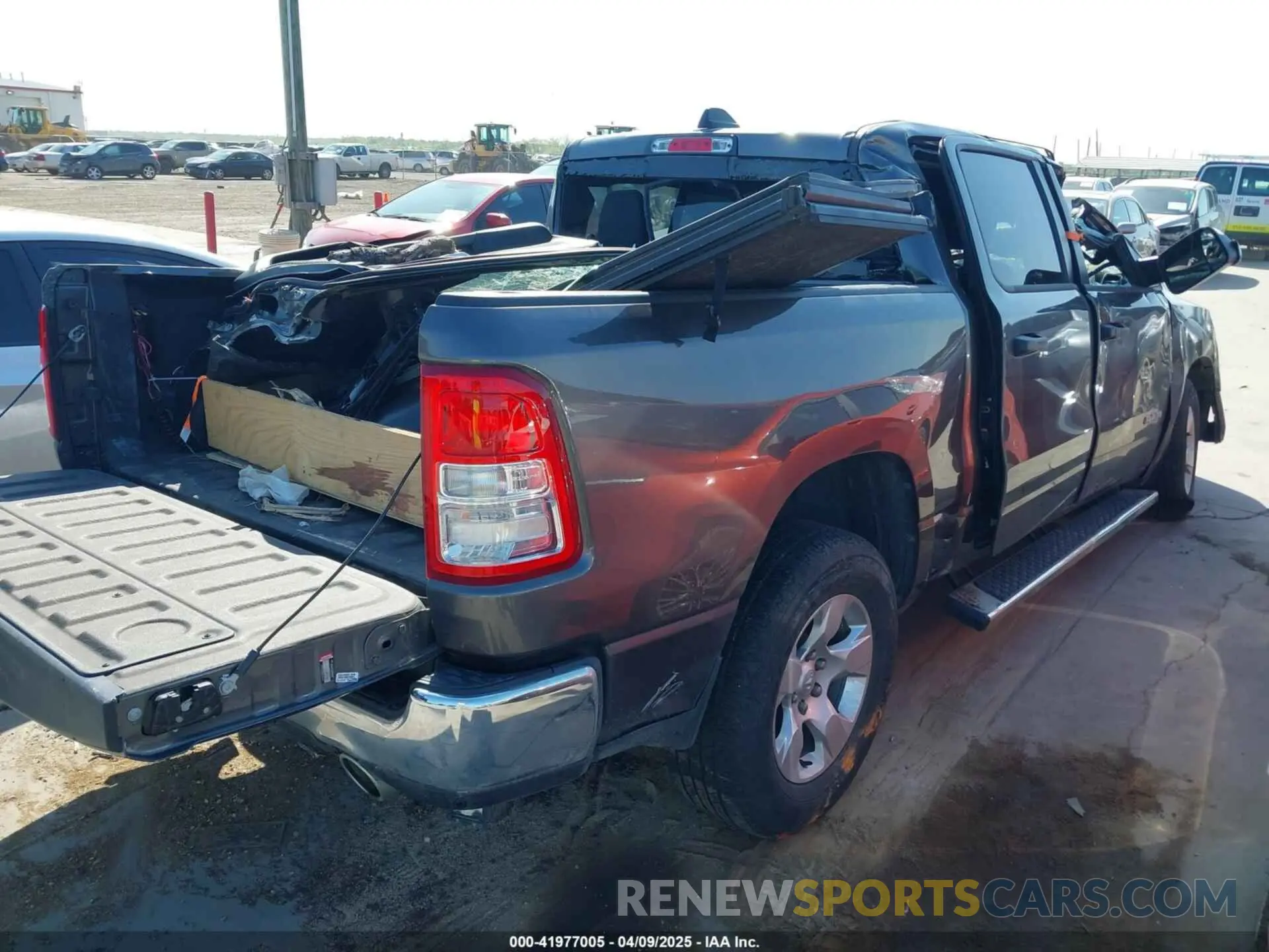 4 Photograph of a damaged car 1C6SRFFT6PN642861 RAM 1500 2023