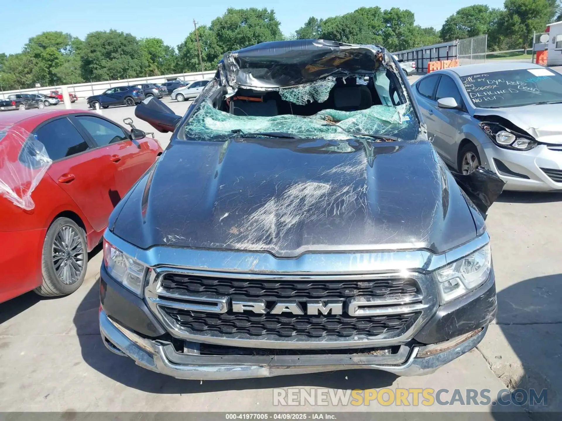 6 Photograph of a damaged car 1C6SRFFT6PN642861 RAM 1500 2023