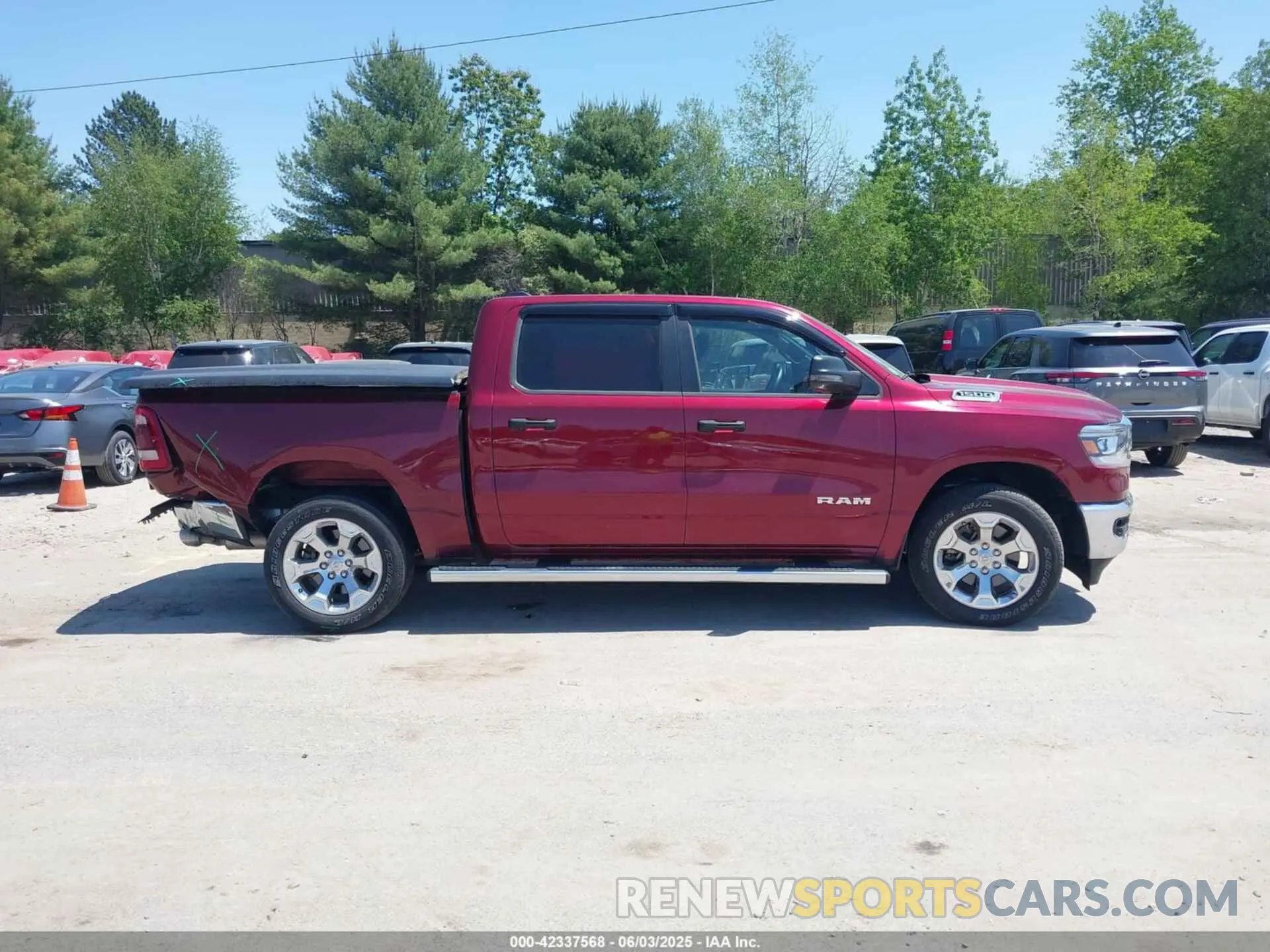 13 Photograph of a damaged car 1C6SRFFT6PN685743 RAM 1500 2023