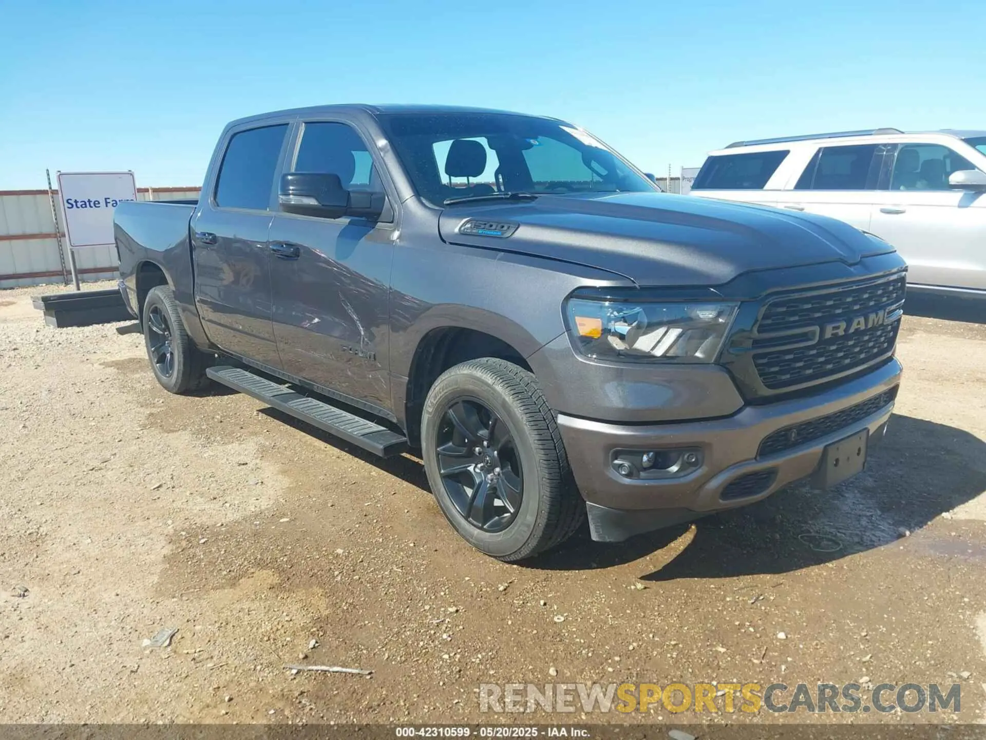 1 Photograph of a damaged car 1C6SRFFT8PN563045 RAM 1500 2023