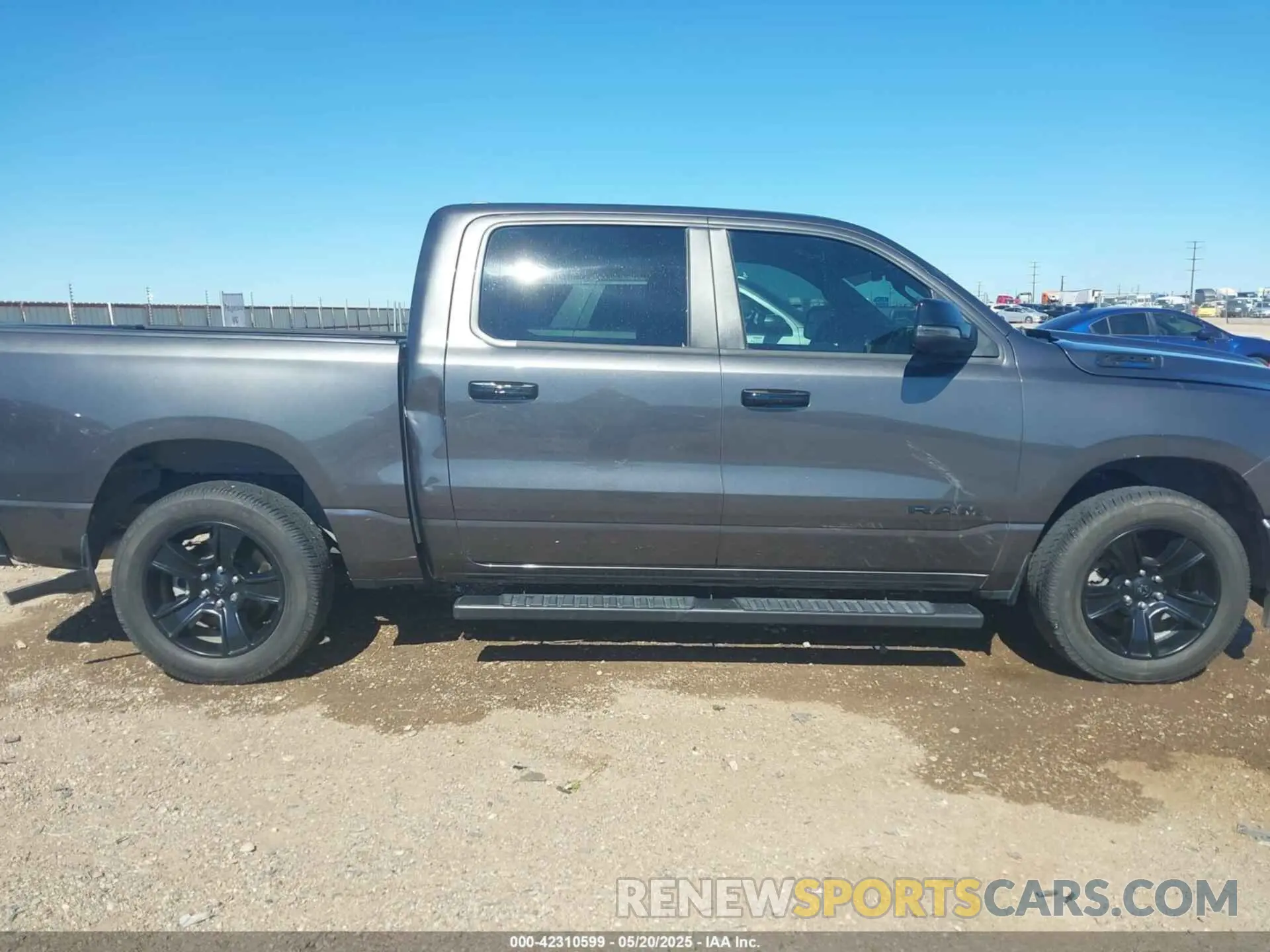 13 Photograph of a damaged car 1C6SRFFT8PN563045 RAM 1500 2023