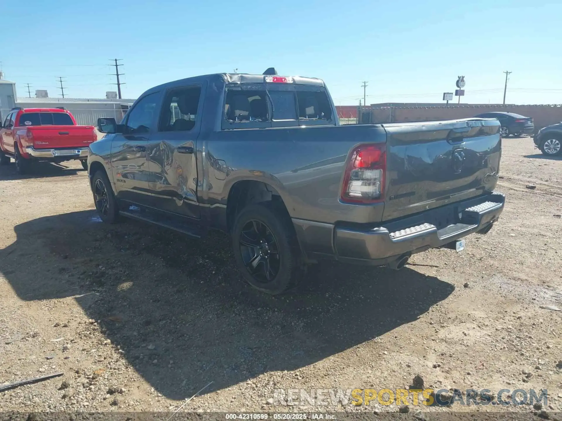 3 Photograph of a damaged car 1C6SRFFT8PN563045 RAM 1500 2023