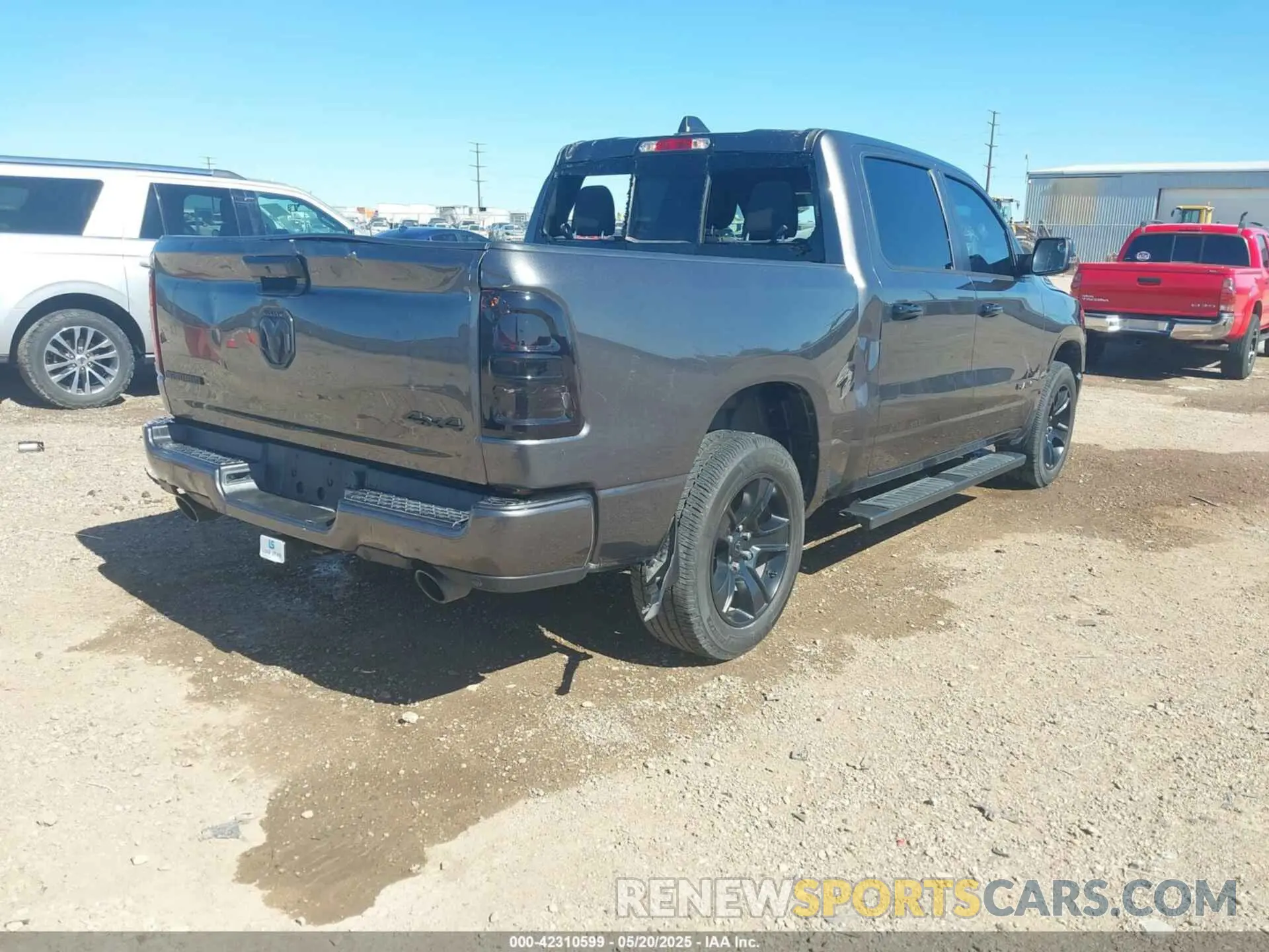 4 Photograph of a damaged car 1C6SRFFT8PN563045 RAM 1500 2023