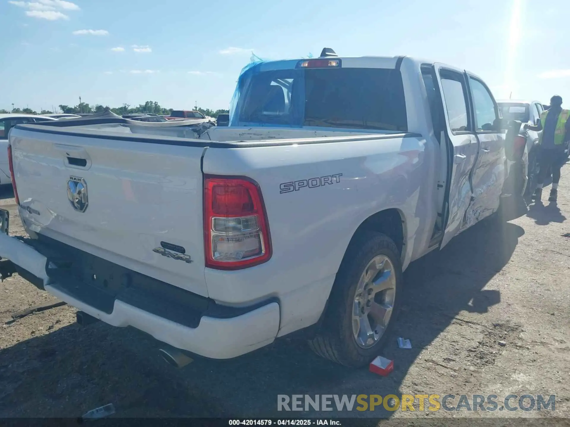 4 Photograph of a damaged car 1C6SRFFT8PN701084 RAM 1500 2023
