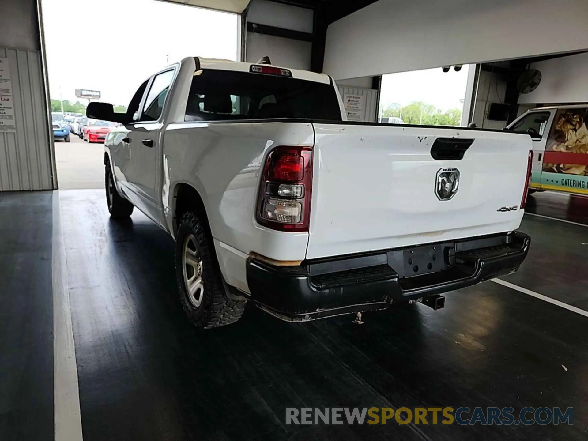 22 Photograph of a damaged car 1C6SRFGT2PN560947 RAM 1500 2023