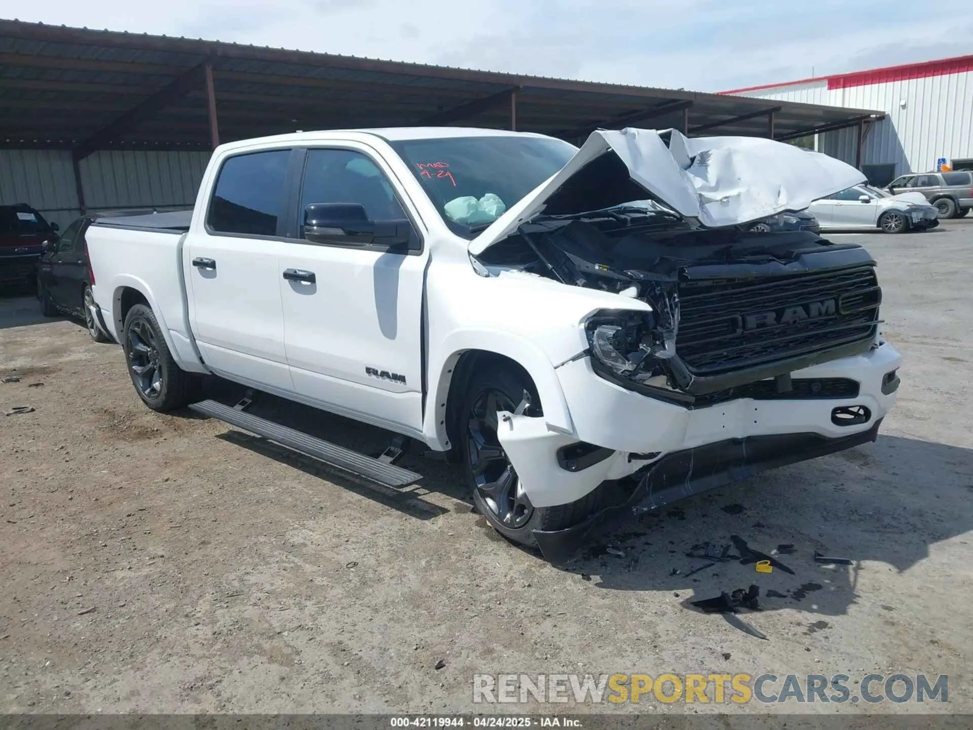 1 Photograph of a damaged car 1C6SRFHT0PN581813 RAM 1500 2023