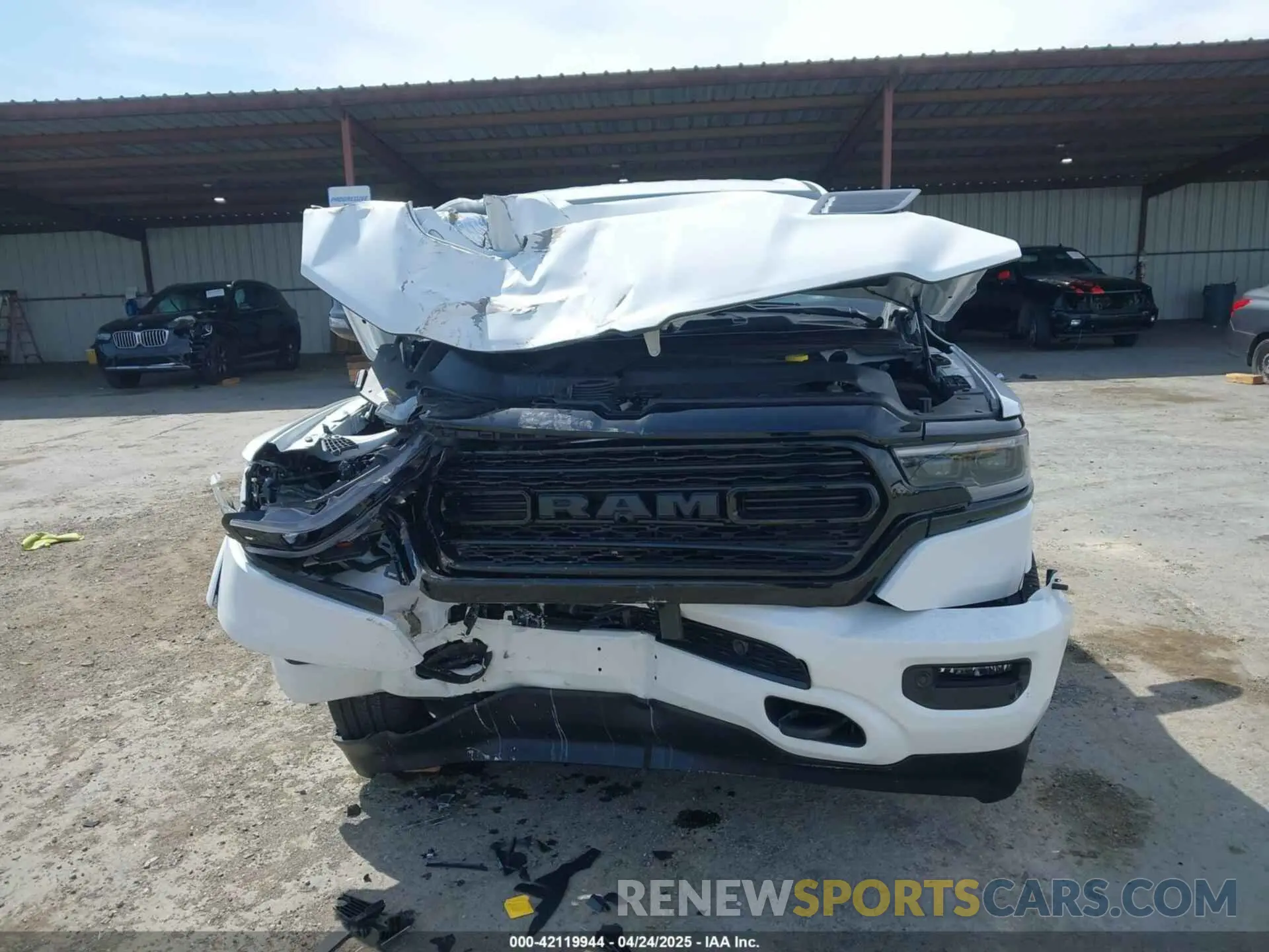 12 Photograph of a damaged car 1C6SRFHT0PN581813 RAM 1500 2023