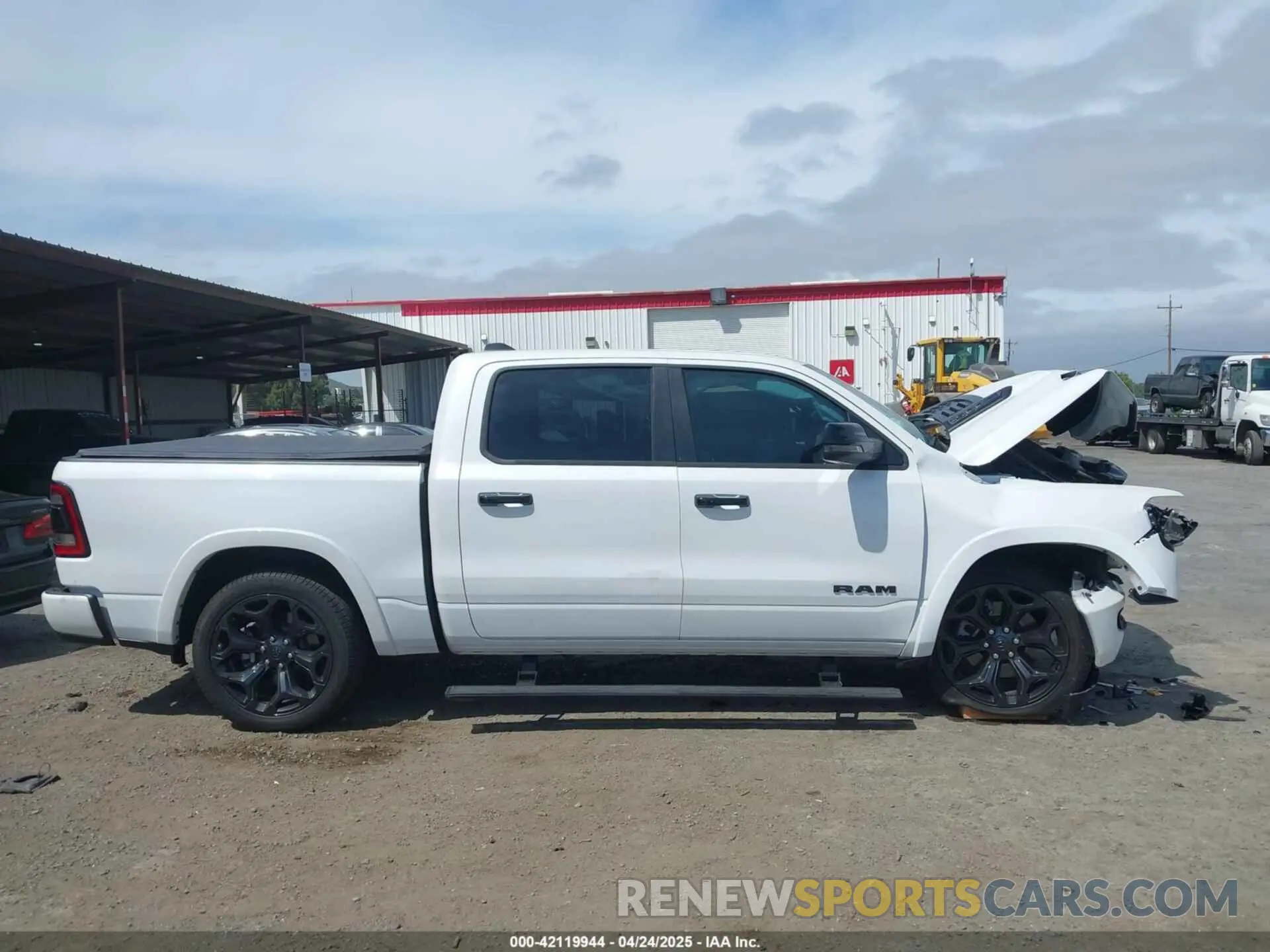 13 Photograph of a damaged car 1C6SRFHT0PN581813 RAM 1500 2023