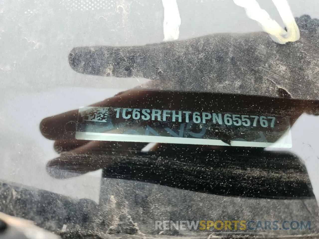12 Photograph of a damaged car 1C6SRFHT6PN655767 RAM 1500 2023