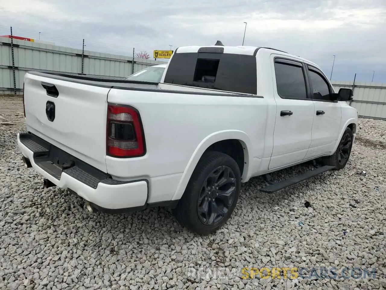 3 Photograph of a damaged car 1C6SRFHT6PN655767 RAM 1500 2023