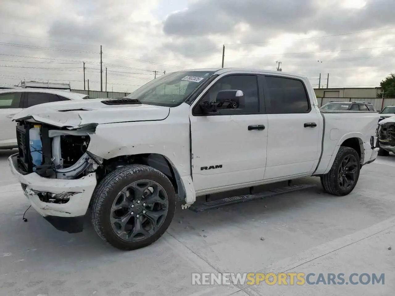 1 Photograph of a damaged car 1C6SRFHT7PN564426 RAM 1500 2023