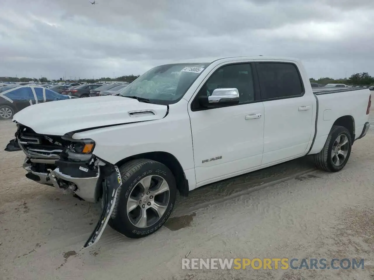 1 Photograph of a damaged car 1C6SRFJM8PN515125 RAM 1500 2023