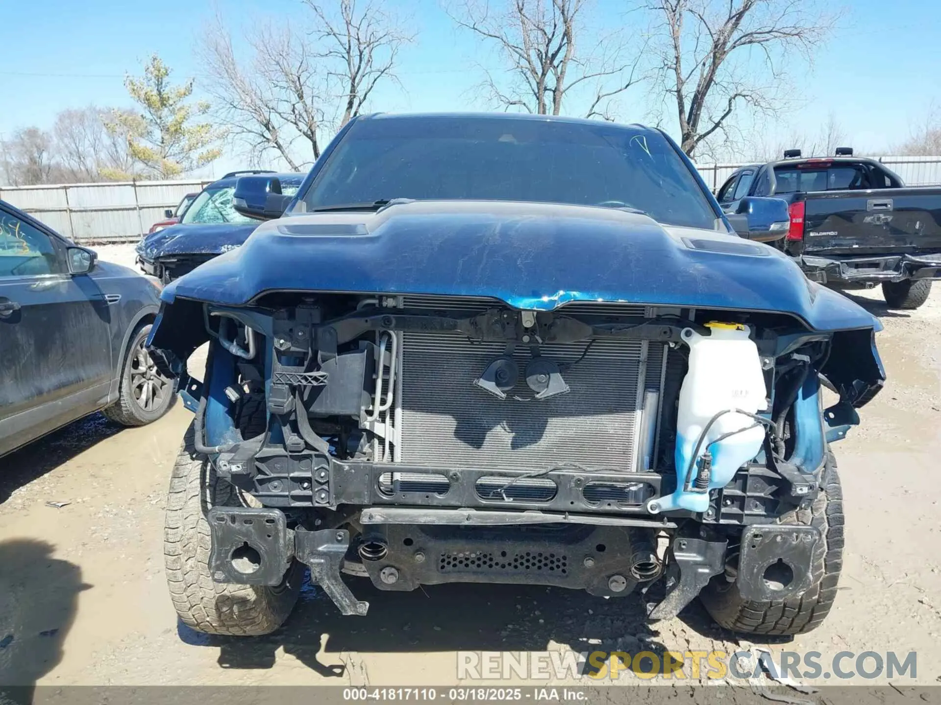 12 Photograph of a damaged car 1C6SRFJMXPN549423 RAM 1500 2023