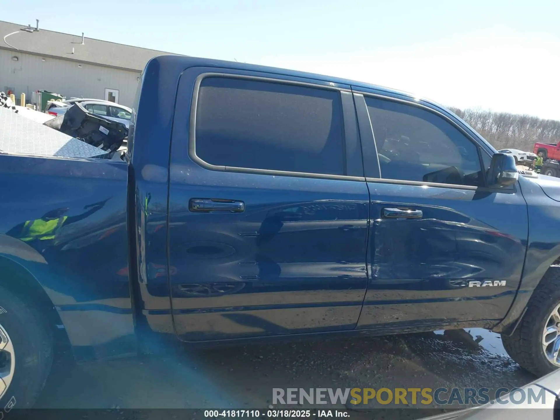 13 Photograph of a damaged car 1C6SRFJMXPN549423 RAM 1500 2023