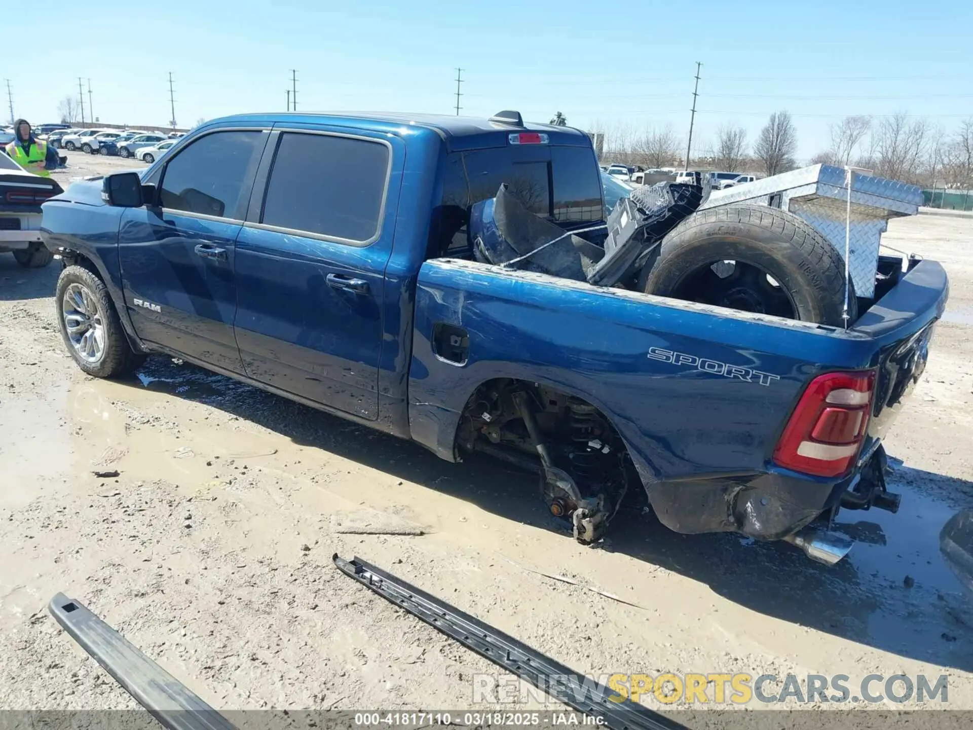 3 Photograph of a damaged car 1C6SRFJMXPN549423 RAM 1500 2023