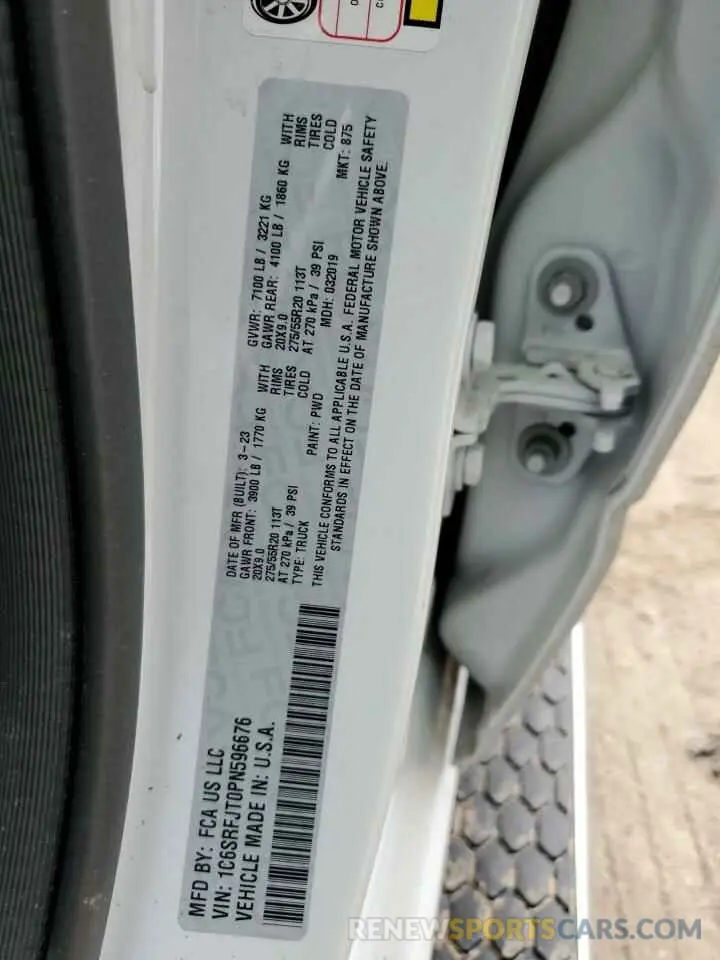 14 Photograph of a damaged car 1C6SRFJT0PN596676 RAM 1500 2023